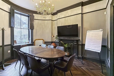 Classic Georgian Boardroom With Fireplace and Smart Screen for Strategy Sessions